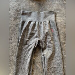 Gray and pink Gymshark sports Gymshark leggings.